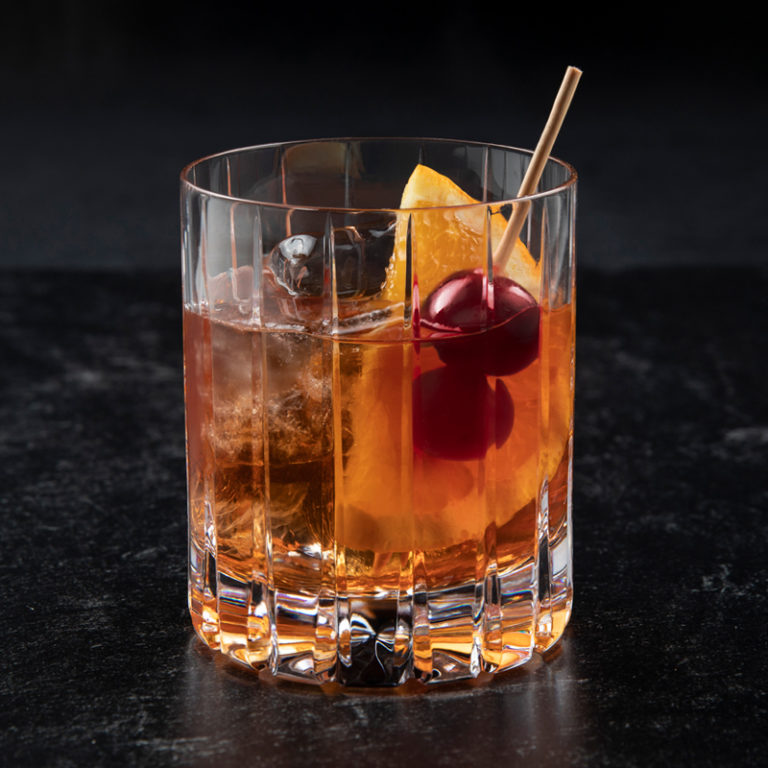 A soulboxer old fashioned in a cocktail glass.