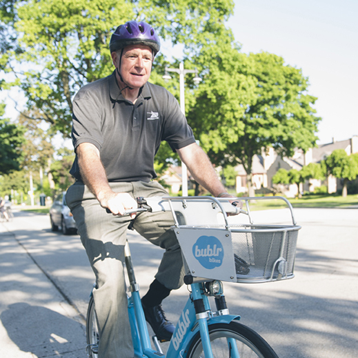 Mayor Tom Barrett riding a bublr bike.